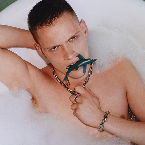 An image of a man wearing jewels from the new Diesel Spring Summer 2025 collection.